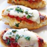 Keto chicken parmesan is served on a white plate.