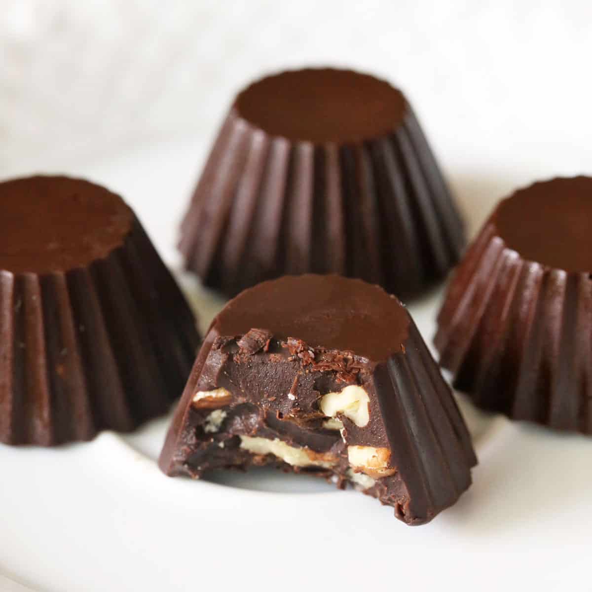 Keto chocolate is served on a white plate.