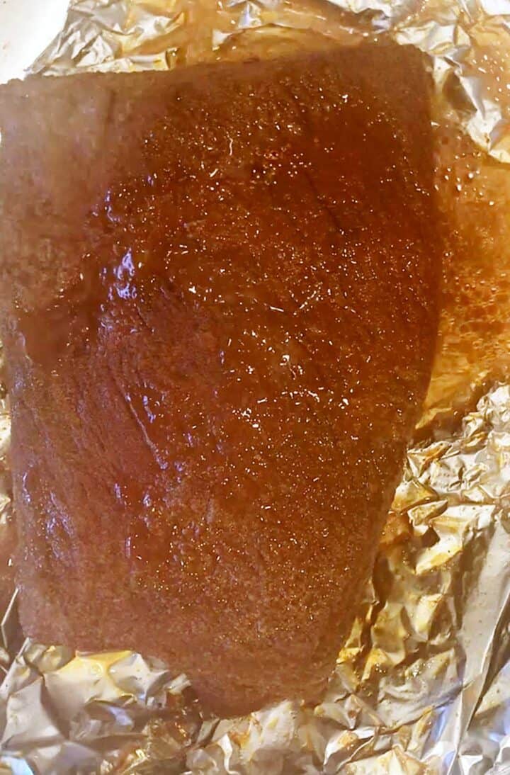 The brisket foil pouch is opened.