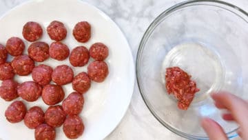 Forming the meatballs.