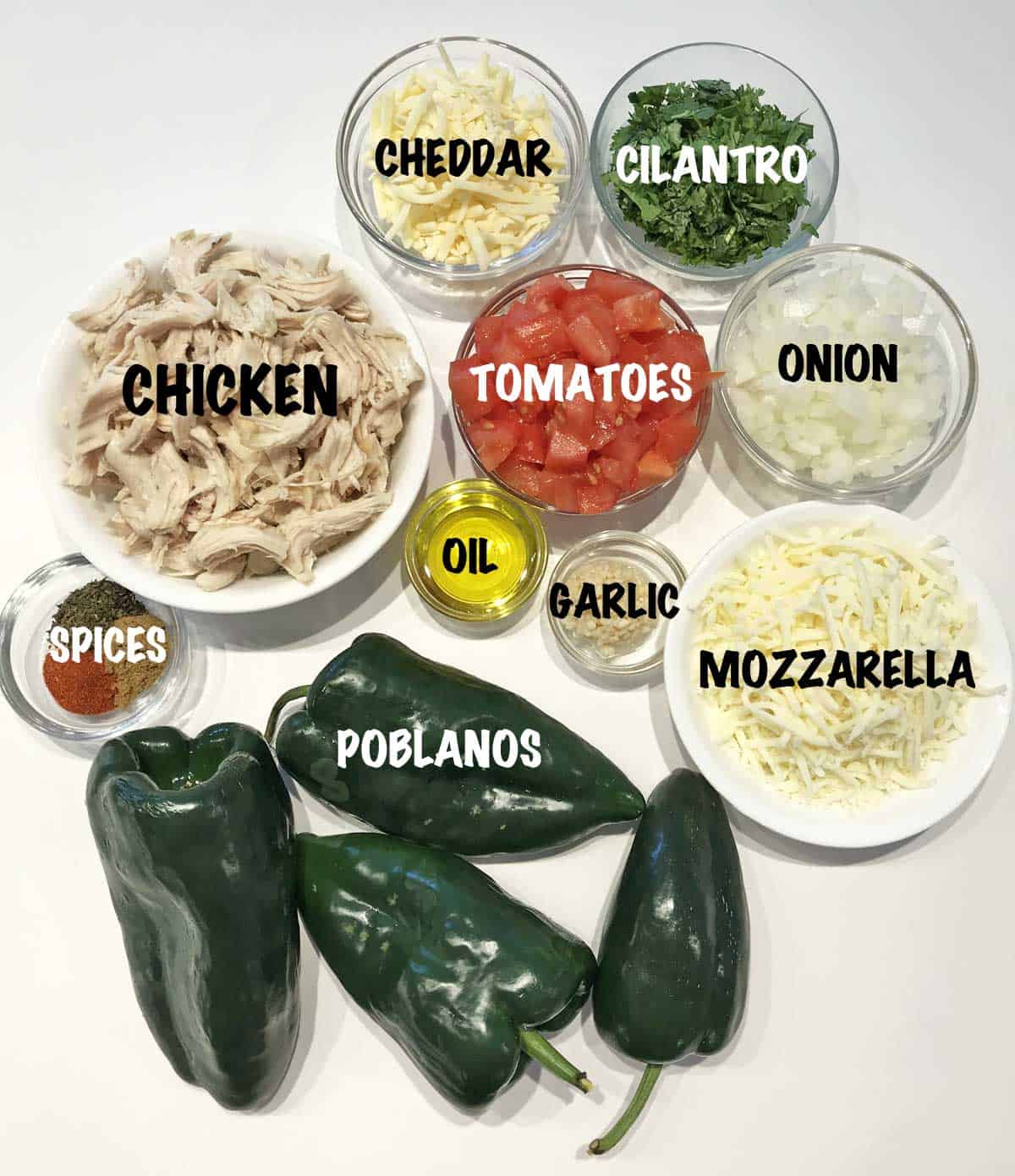 The ingredients needed to make stuffed poblanos.