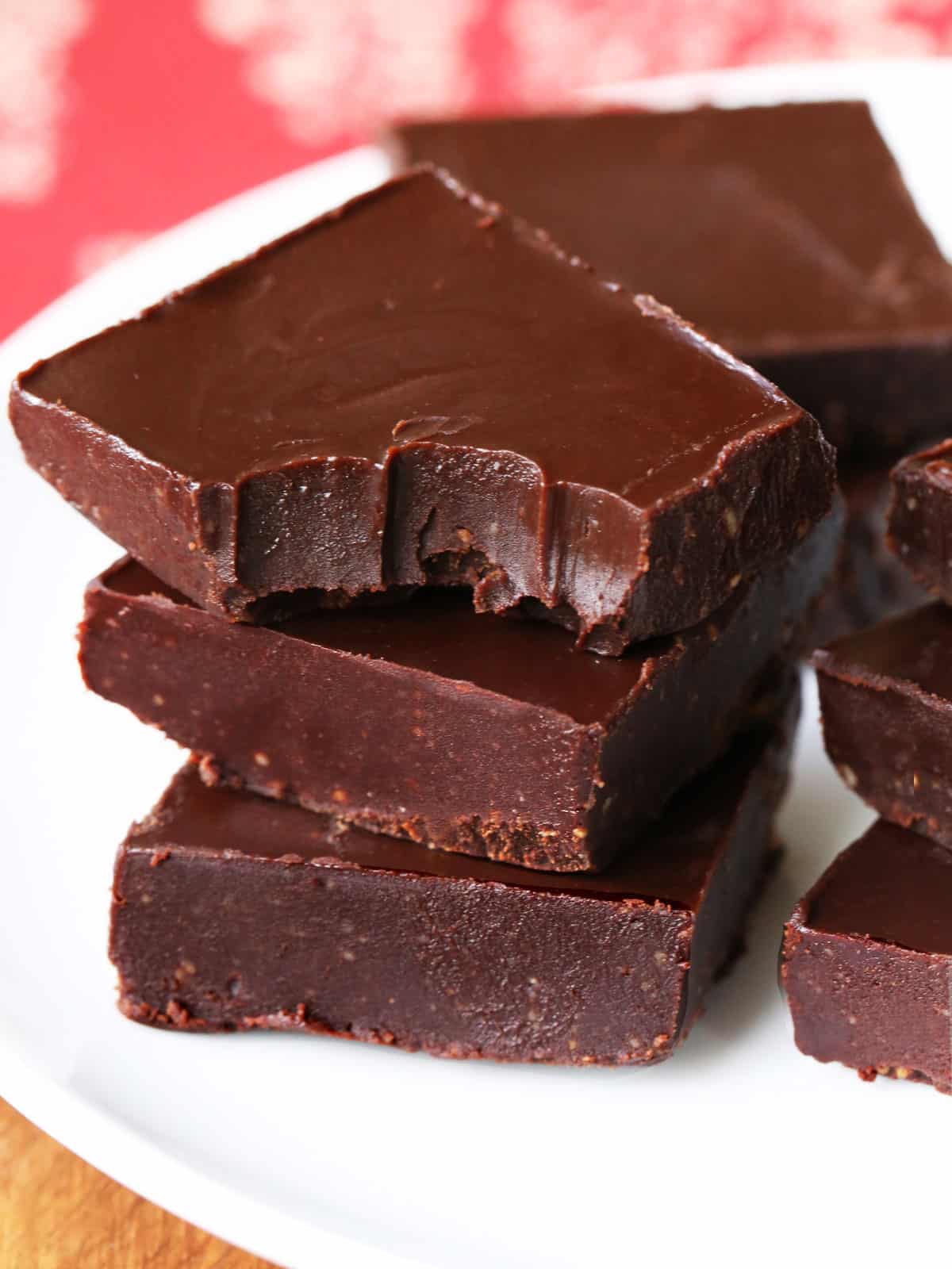 Keto fudge is served on a white plate. 