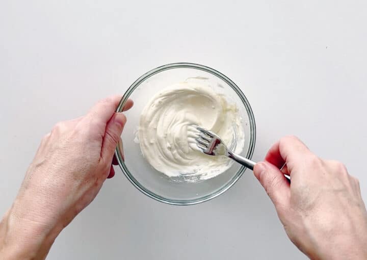 Mixing the frosting.