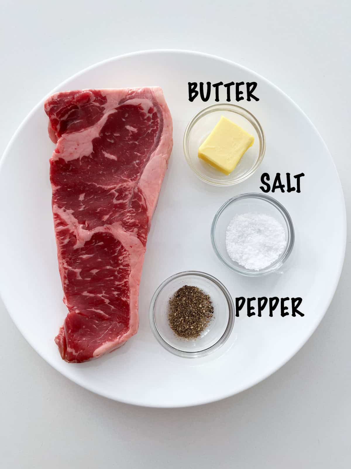 The ingredients needed to cook a reverse sear steak.