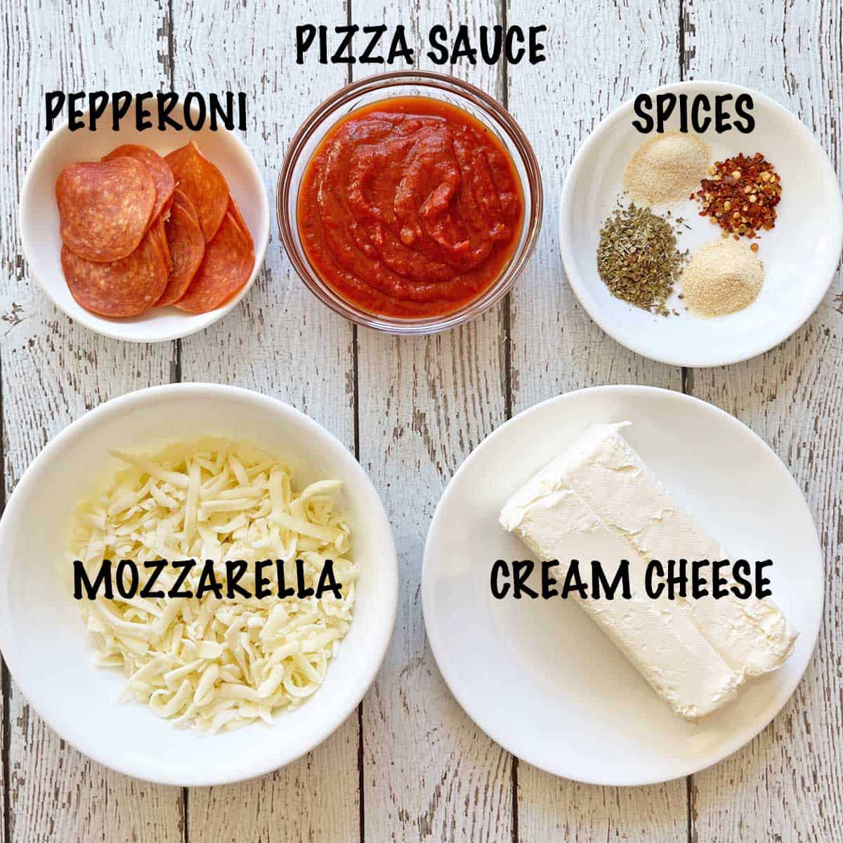 The ingredients needed to make a pizza dip.