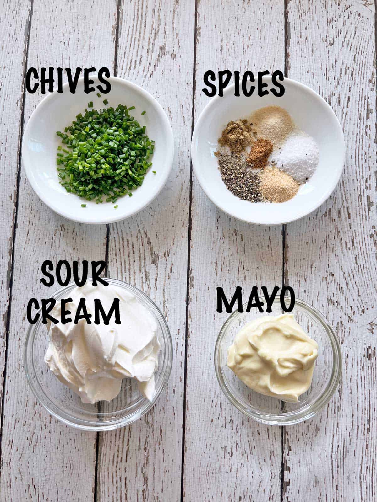 The ingredients needed to make a sour cream dip.
