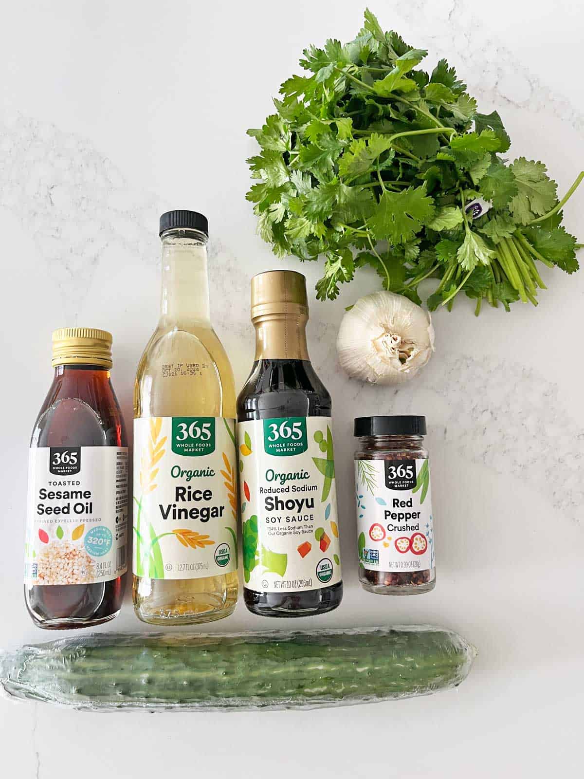 The ingredients needed to make an Asian cucumber salad.