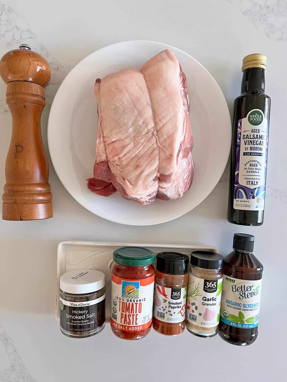 The ingredients needed to cook pulled pork in the slow cooker.