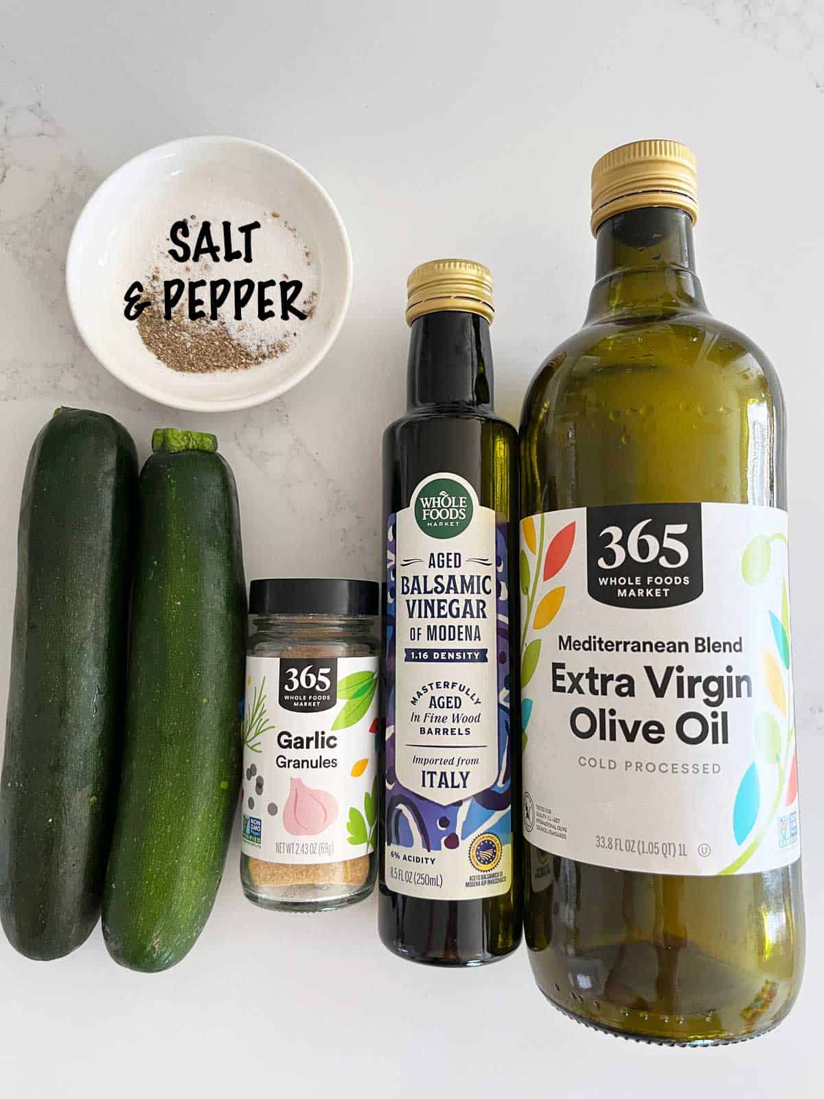 The ingredients needed to make grilled zucchini.