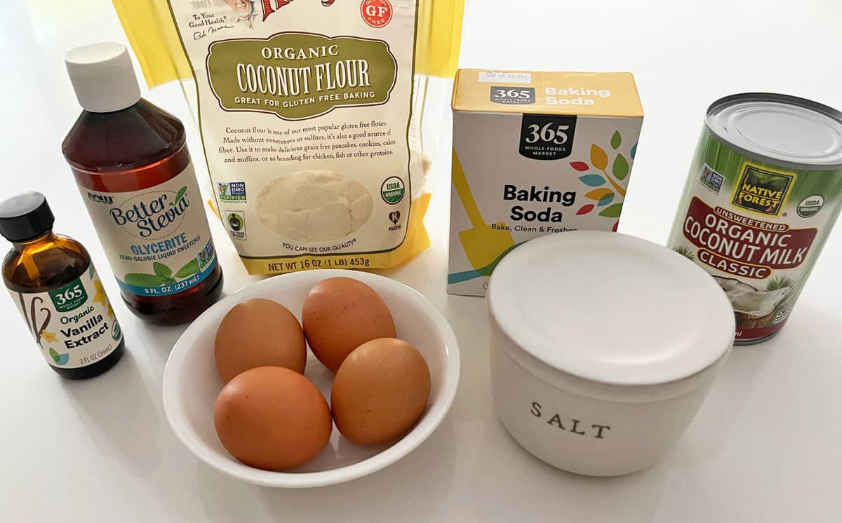 The ingredients needed to make coconut flour muffins.