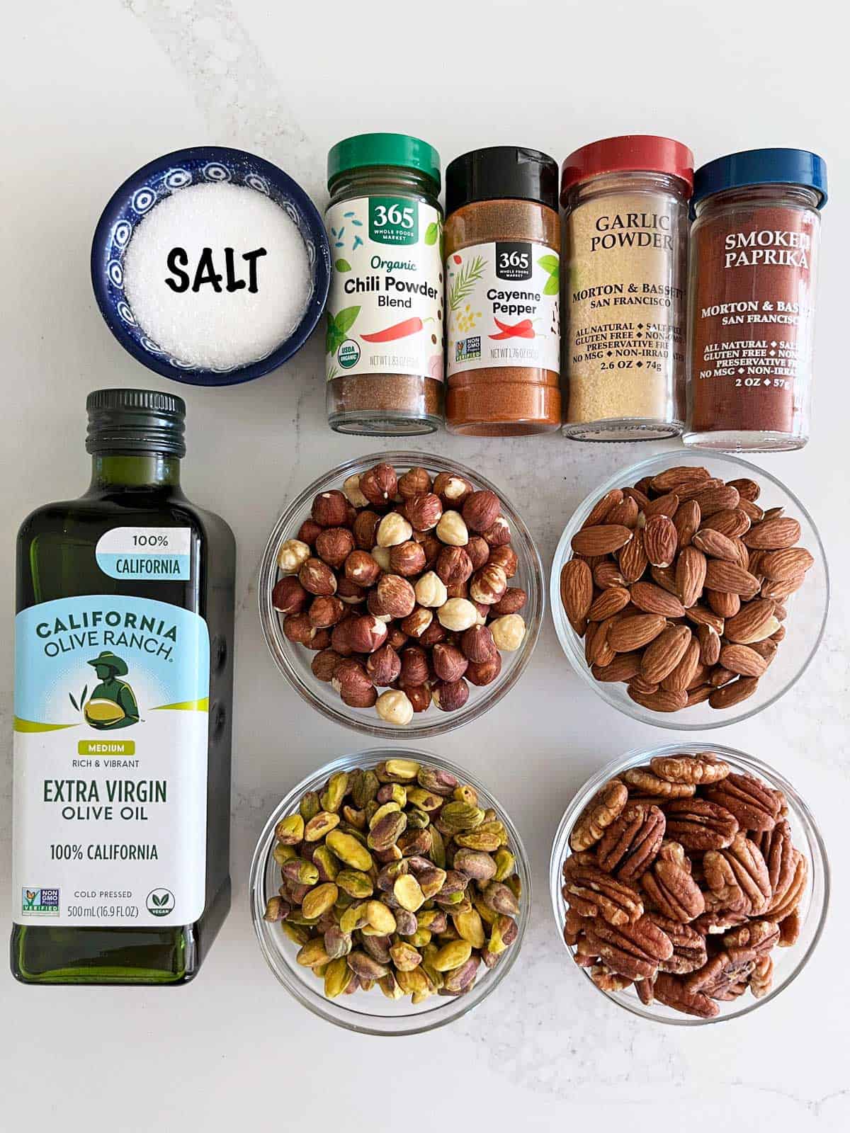 The ingredients needed to make roasted nuts.