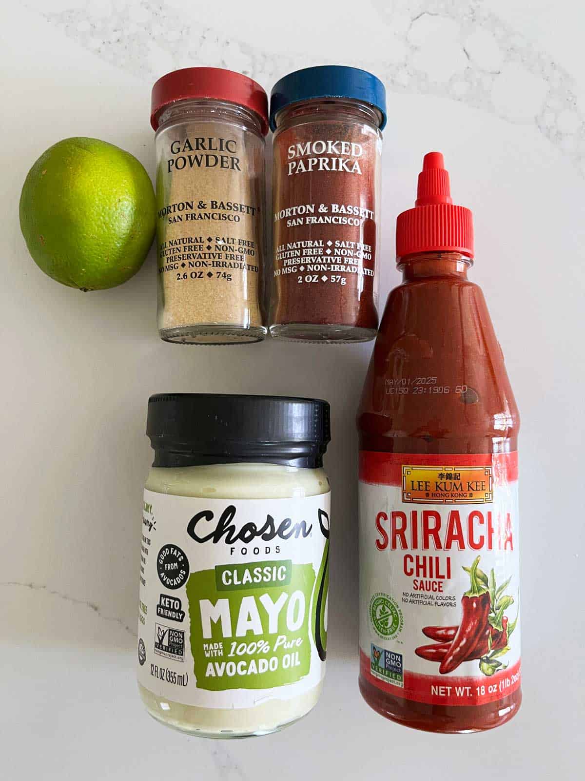 The ingredients needed to make sriracha mayo.