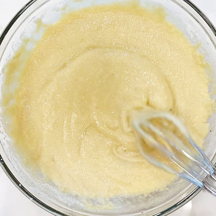 Adding the dry ingredients to the bowl.