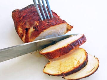 Slicing blackened chicken.