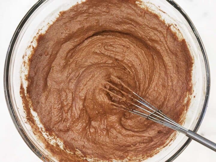 Adding almond flour and cocoa powder.