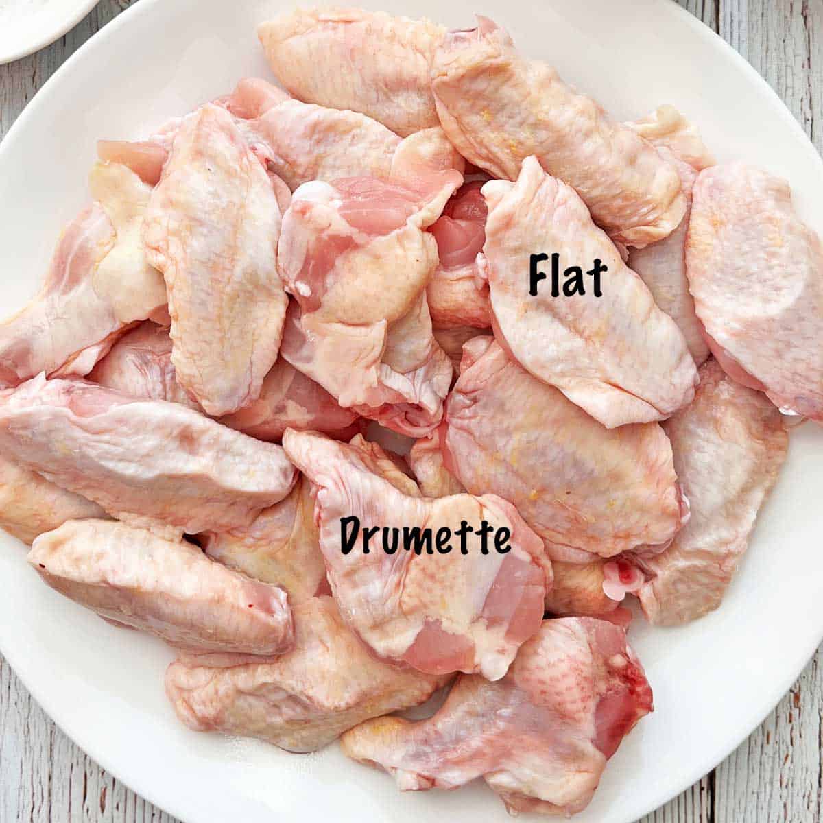 Split wings (party wings) on a plate.