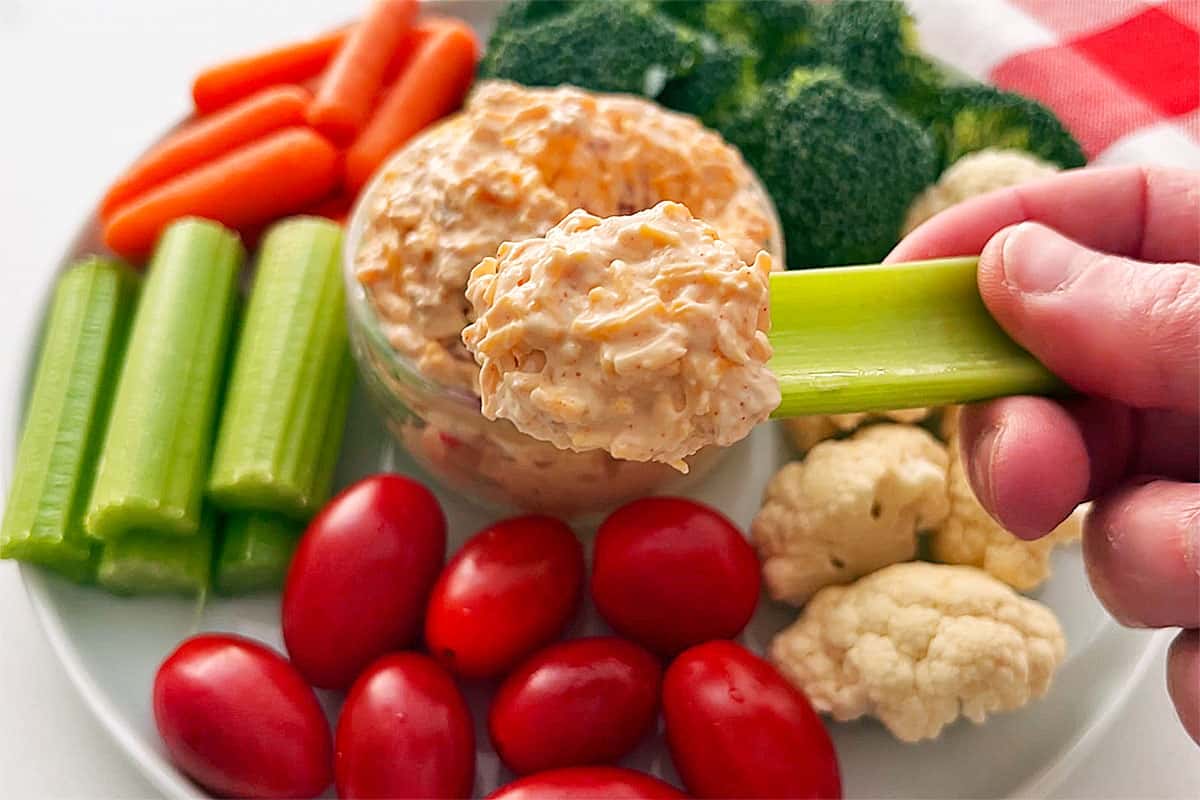Serving cream cheese dip with veggies. 