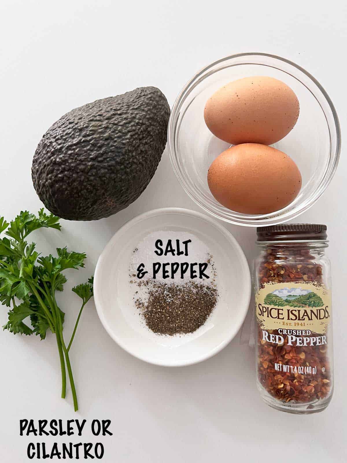 The ingredients needed to make an avocado egg bake.