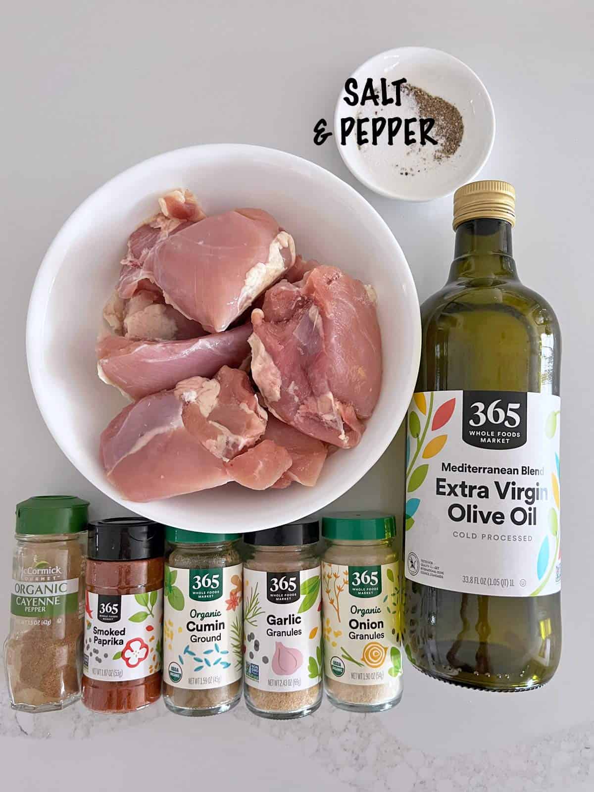 The ingredients needed to bake boneless chicken thighs.
