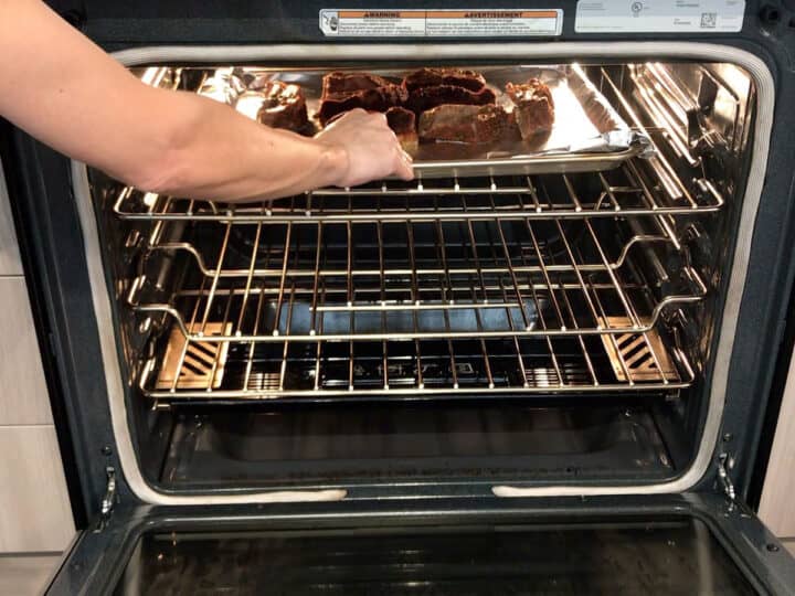 Placing the ribs under the broiler.