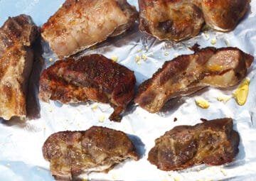 The ribs on a foil-lined baking sheet.