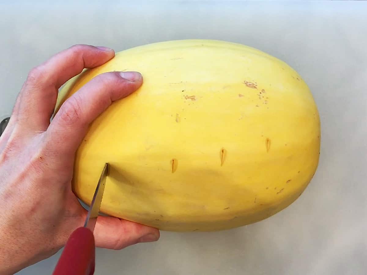 Pierce spaghetti squash with a fork.