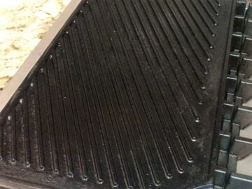 Double-burner grill pan being heated.