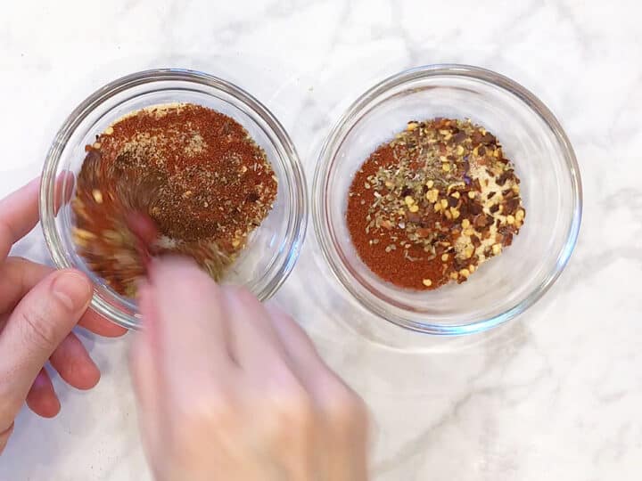 Two small bowls with spices.