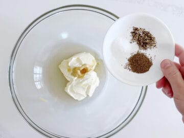 Mixing the coleslaw dressing.