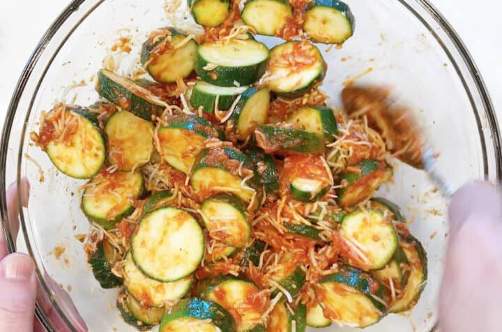 Mixing the casserole ingredients in a bowl.
