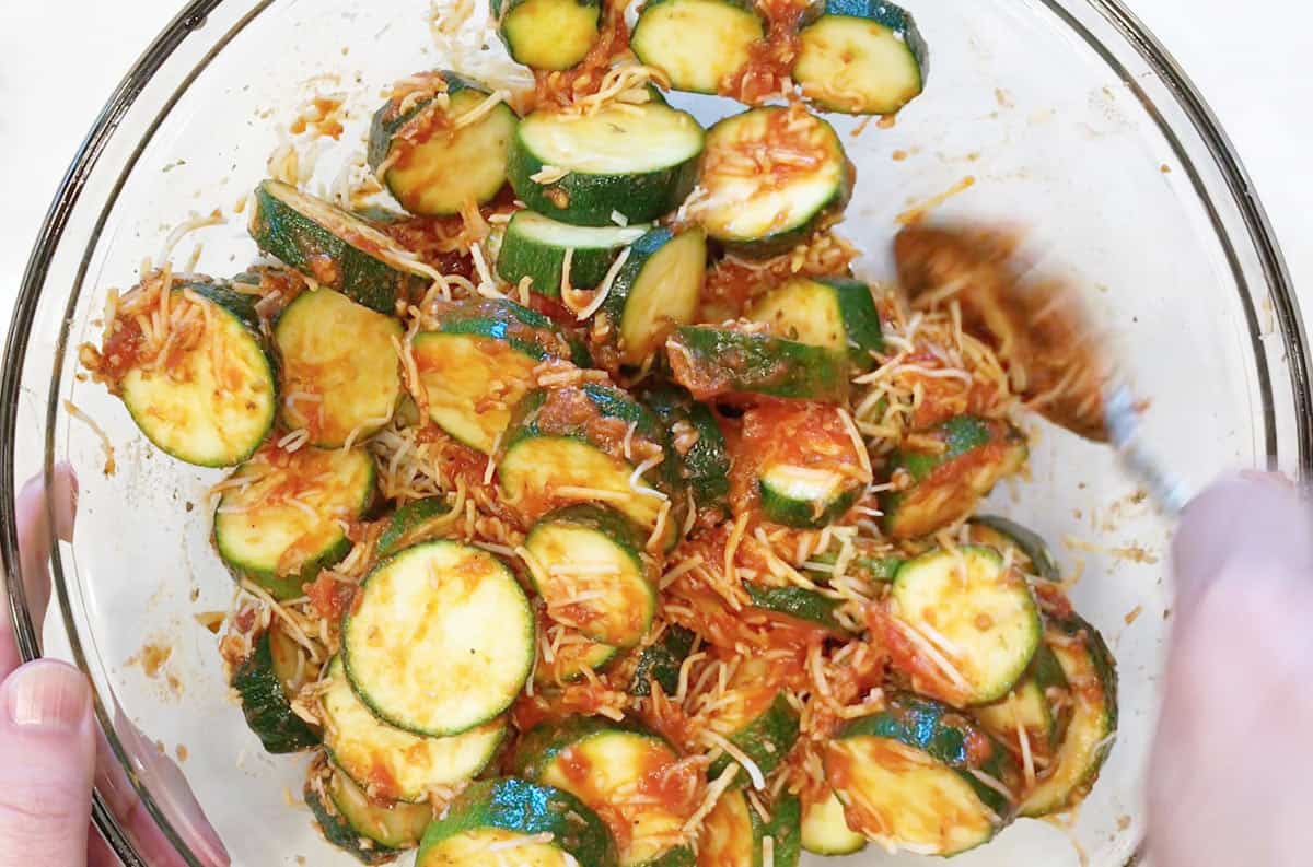 Mixing the casserole ingredients in a bowl.