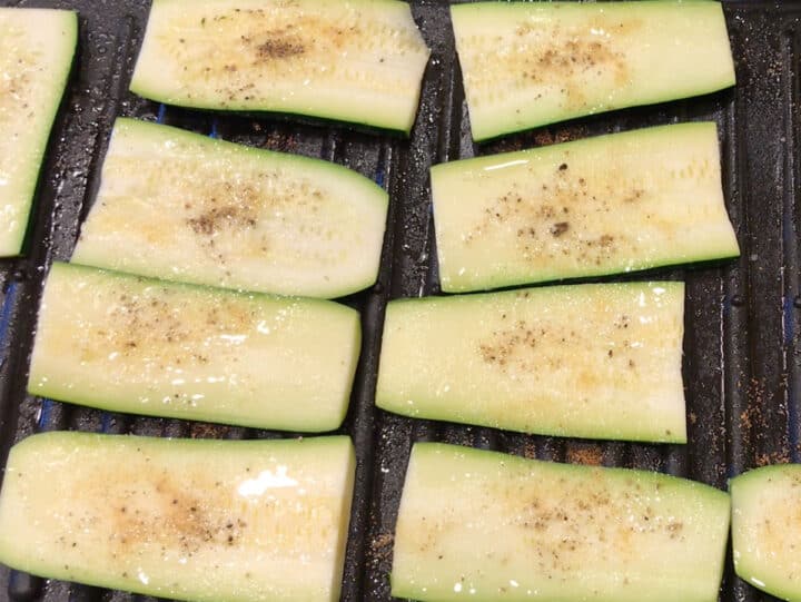 Seasoned zucchini slices.