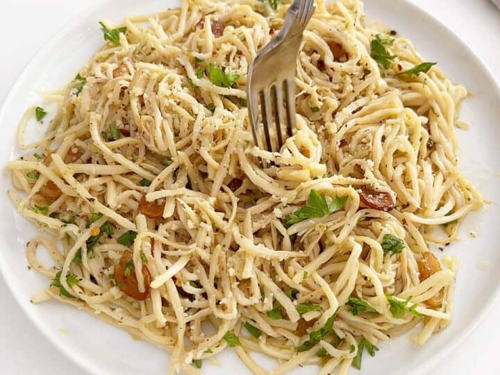 The pasta is served with a fork.