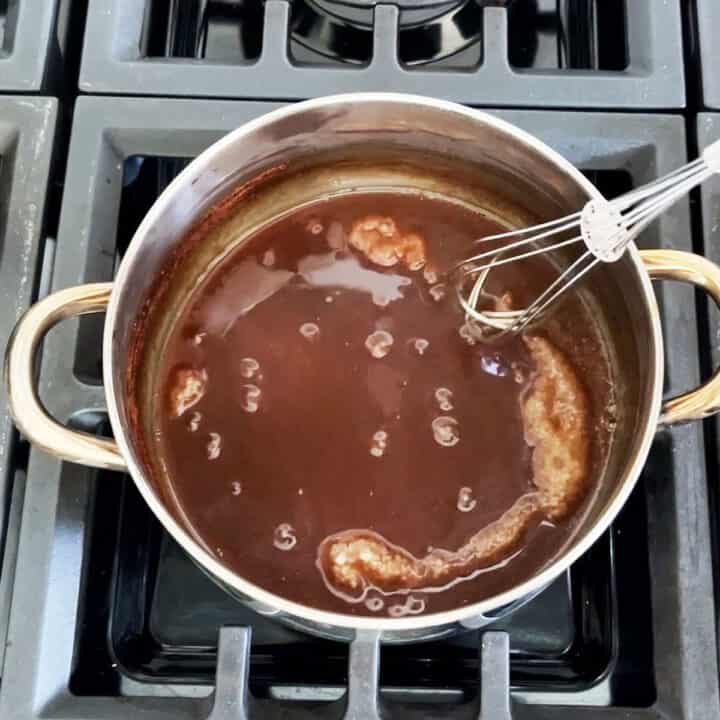 Reducing the cooking liquids on the stovetop.