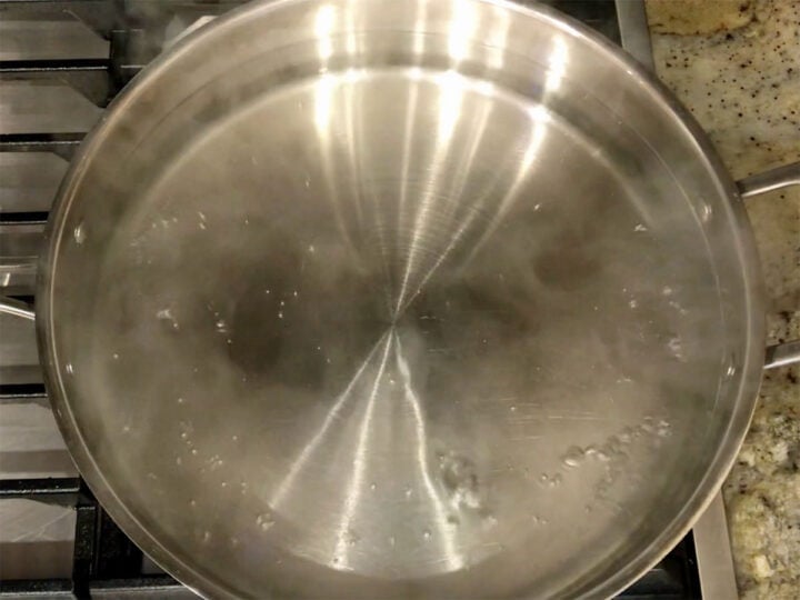 Boiling water in a saucepan.