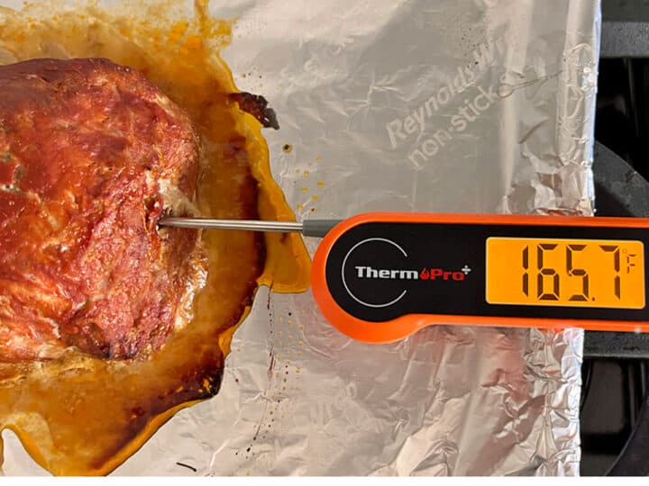 The meatloaf has reached an internal temperature of 165*F.