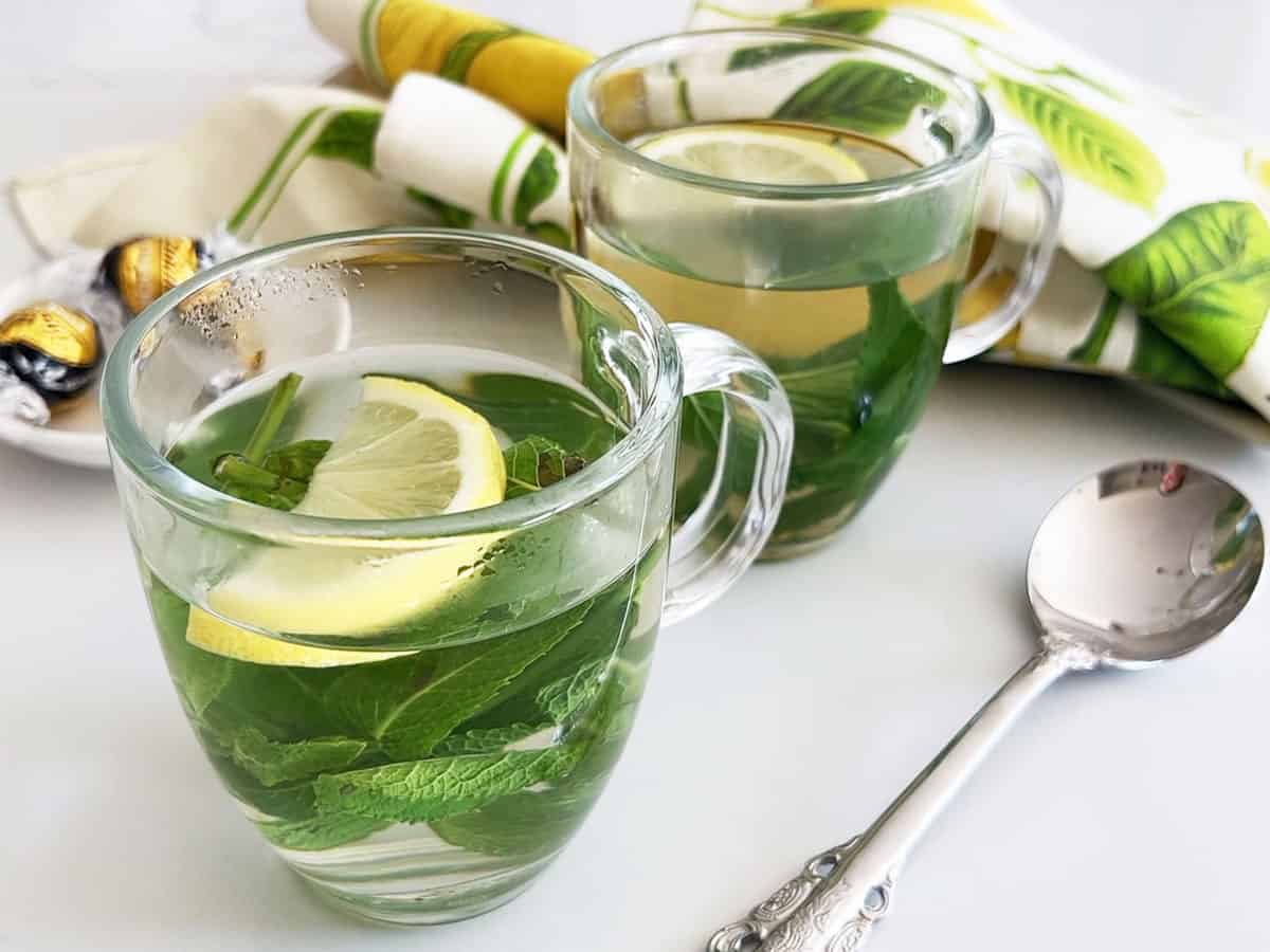 Mint tea is served with chocolate.