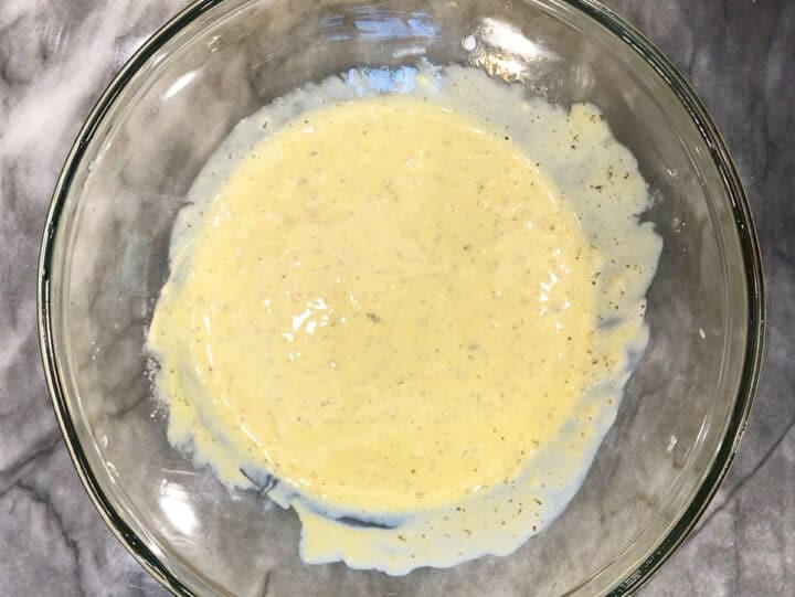 Mixing the liquid ingredients in a bowl.