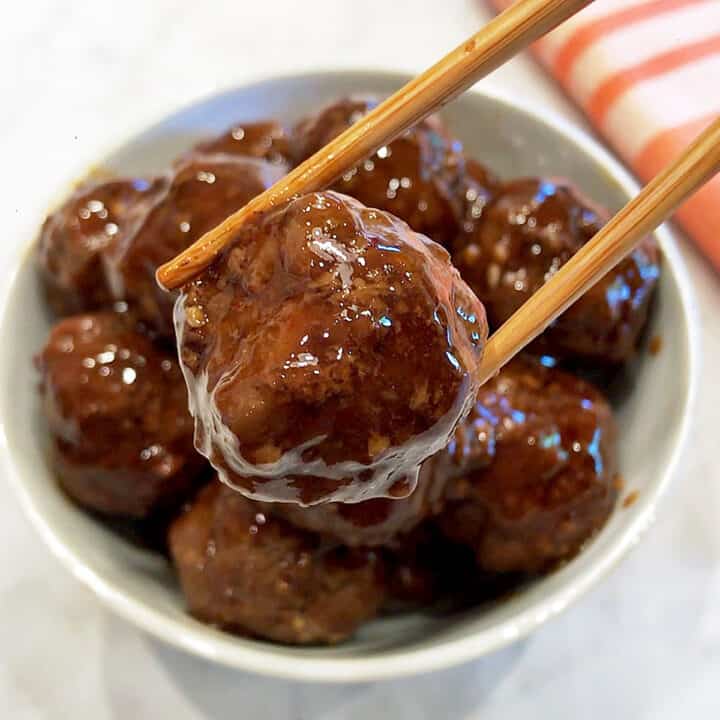 Serving the meatballs.