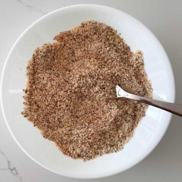 Almond meal and spices are mixed in a bowl.