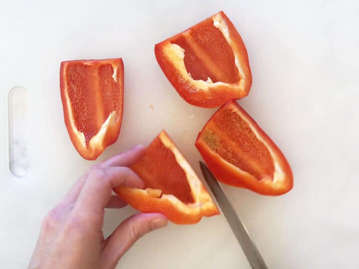 Cutting the peppers.