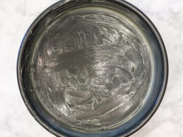 A greased nonstick cake pan.
