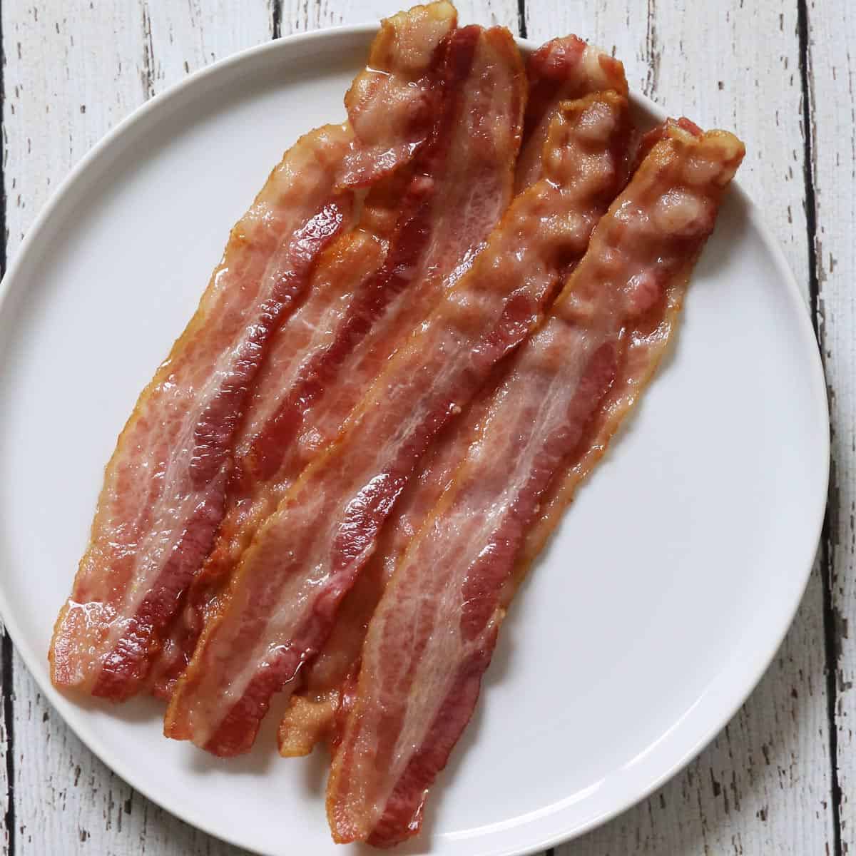 Bacon baked for 15 minutes in a 425°F oven.