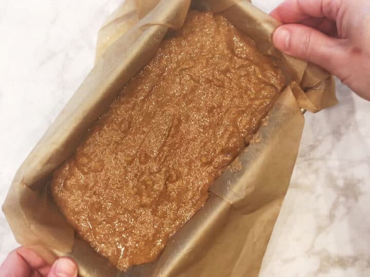 The batter is in the prepared loaf pan.