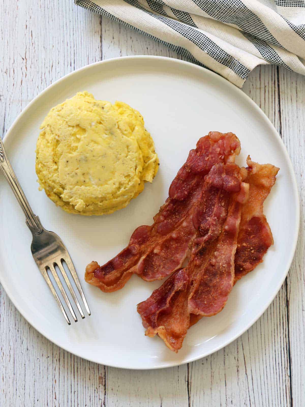 Microwave bacon is served with microwave eggs.