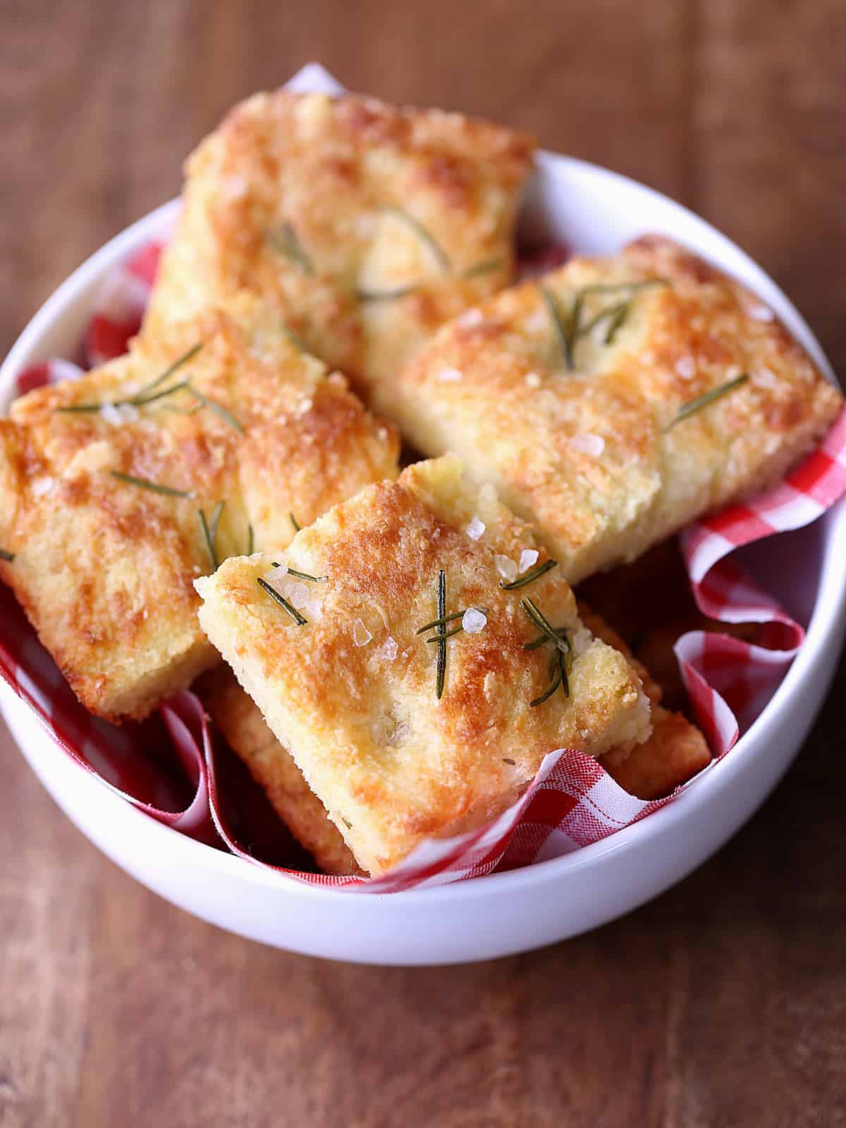 Keto focaccia is served in a white bowl.