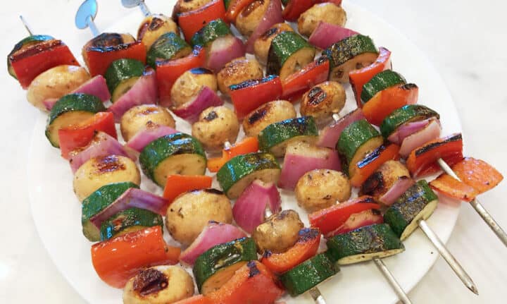 Veggie kabobs are served.