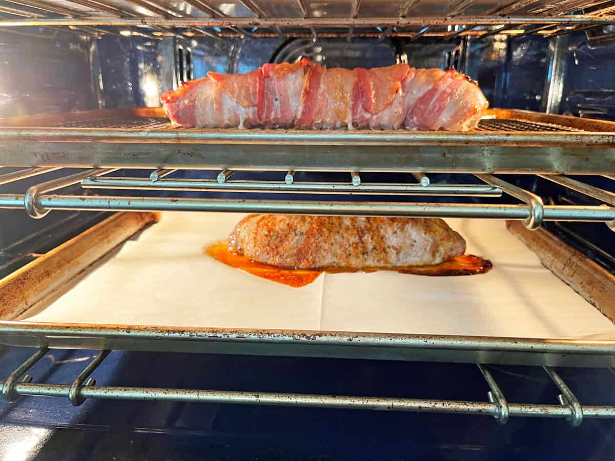 Bacon-wrapped pork tenderloin and roasted tenderloin in the same oven.