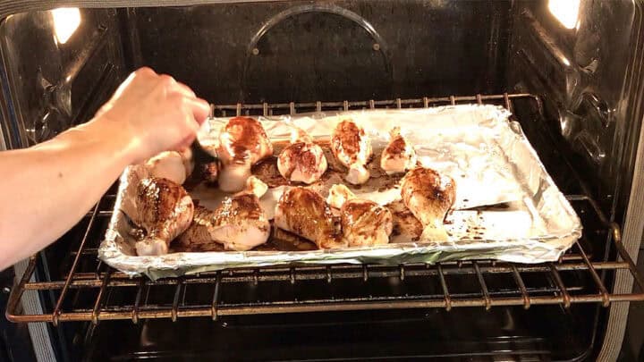 Basting the chicken.