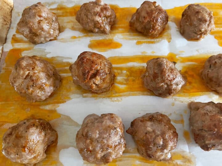 The meatballs are ready in the pan.